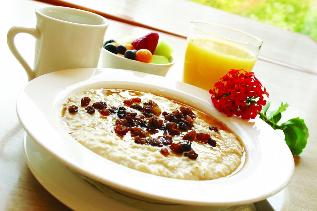 Breakfast of freshly prepared oatmeal topped with raisins. Served with your choice of coffee or orange juice and a cup of fruit.