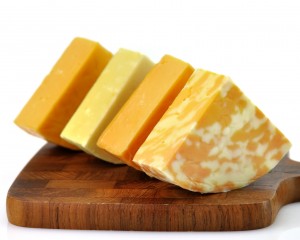 cheese assortment on a cutting board