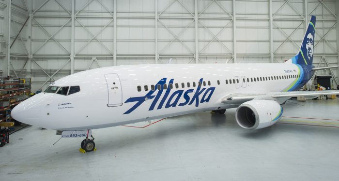 An Alaska Airlines 737-800, newly painted in the airline’s 2016 refreshed brand, is ready to be revealed at the airline's maintenance hangar in SeaTac, Washington on Jan. 25, 2016. This month, Alaska Airlines revealed the most substantial updates to its brand in a quarter century. Beginning Jan. 25, Alaska fliers will see the visual updates in new signage at the airport, an all-new airplane paint job, a refreshed website and mobile app, and more.