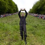 BRITAIN-TRADITION-CHEESE-ROLLING