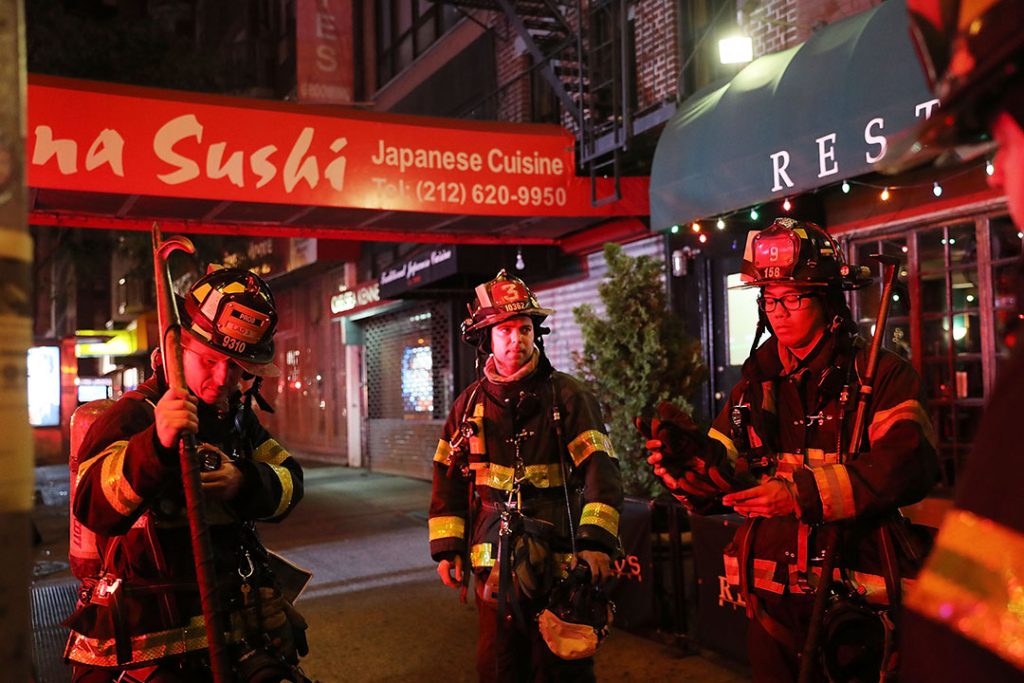 NEW YORK, NY - SEPTEMBER 17: Police, firefighters and emergency workers gather at the scene of an explosion in Manhattan on September 17, 2016 in New York City. The evening explosion at 23rd street in the popular Chelsea neighborhood injured over a dozen people and is being investigated. (Photo by Spencer Platt/Getty Images)